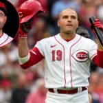 Joey Votto, Cincinnati Reds first baseman, swinging bat at home plate