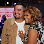 Sunny Anderson Married and Aaron Sanchez sharing a friendly moment at a Food Network event